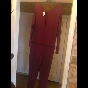 Rust jump suit XL.New with Tag attached .